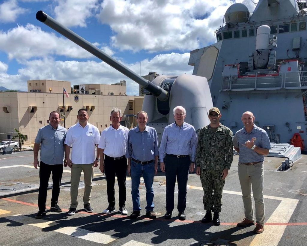 The delegation on the USS John Paul Jones with Commanding Officer Robert Watts.