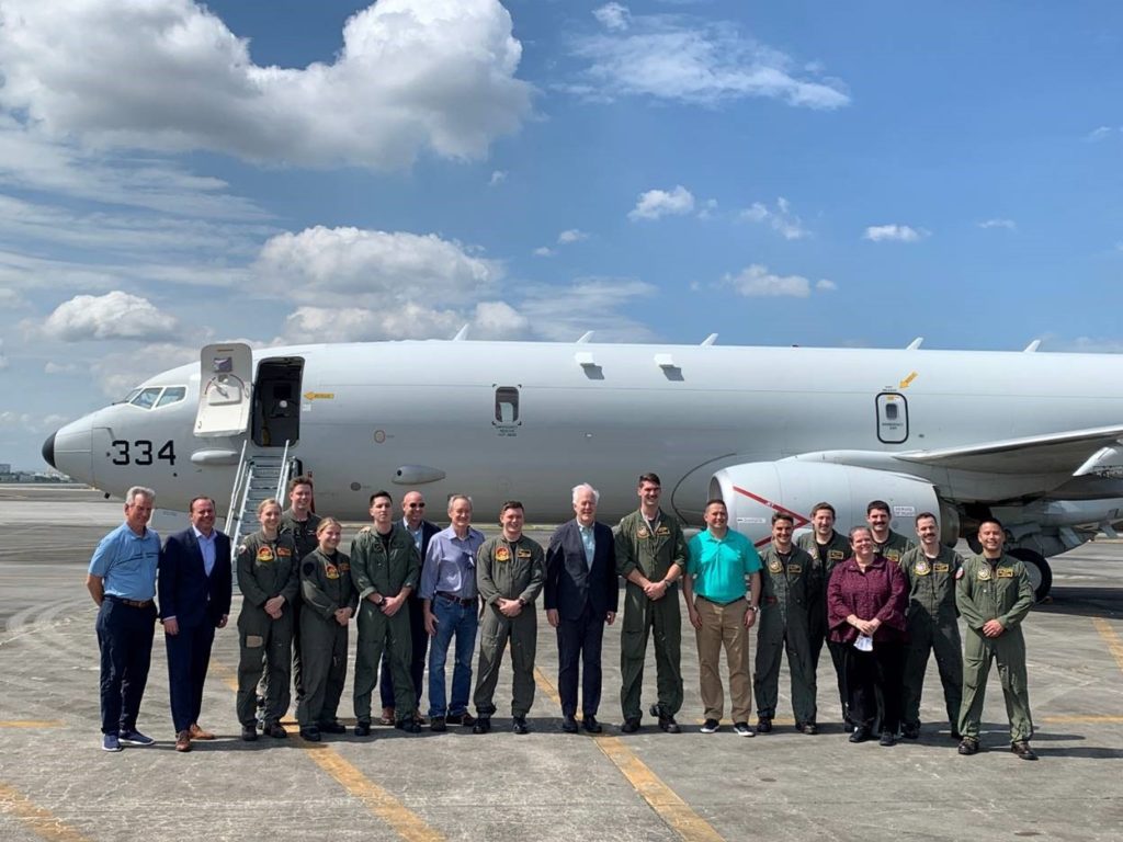 The delegation, Chargé d’Affaires Heather Variava, and the aircrew of a Philippines-based U.S. Navy P-8 before an overflight of the South China Sea.